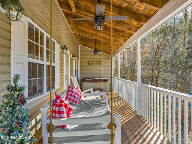 2133 Duck Pond Ln, Sevierville, TN 37876 - wooden deck with ceiling fan and a hot tub