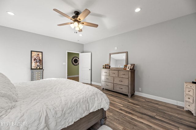 bedroom with dark wood-type flooring and ceiling fan