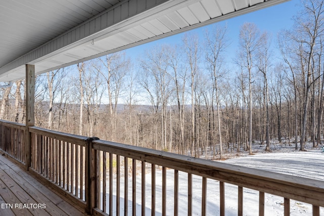 view of snow covered deck