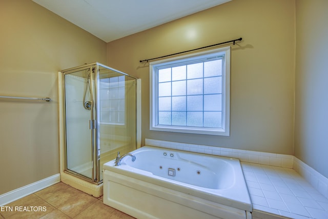 bathroom with tile patterned floors and plus walk in shower