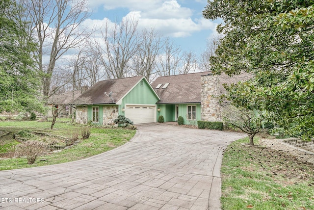 view of front of property with a garage