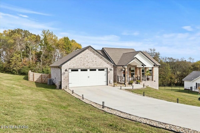 view of front facade featuring a porch, a front lawn, central AC unit, and a garage