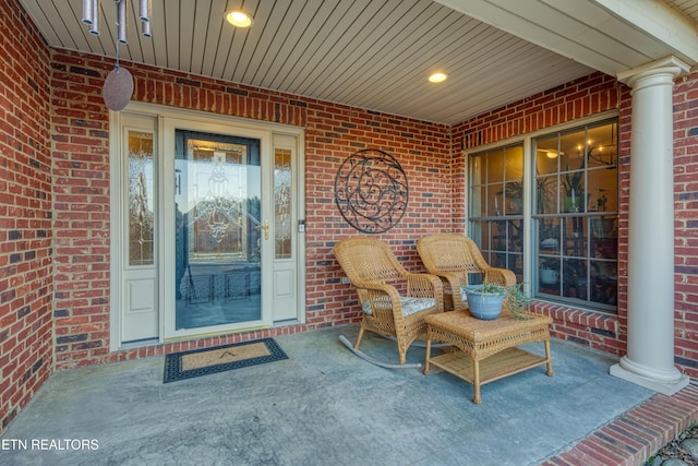 entrance to property featuring covered porch