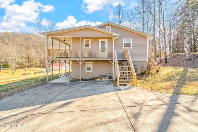 rear view of house with covered porch