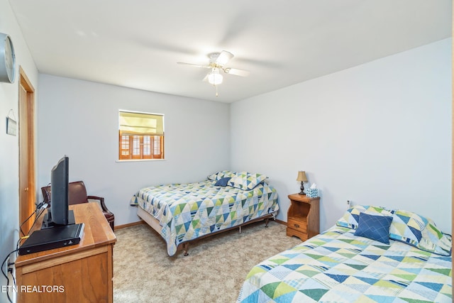 bedroom with ceiling fan and light colored carpet