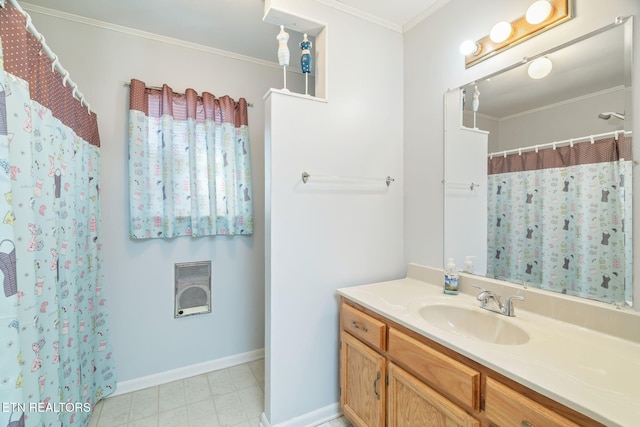 bathroom with walk in shower, vanity, and crown molding