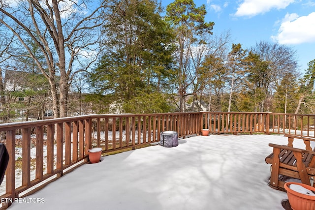 view of snow covered deck