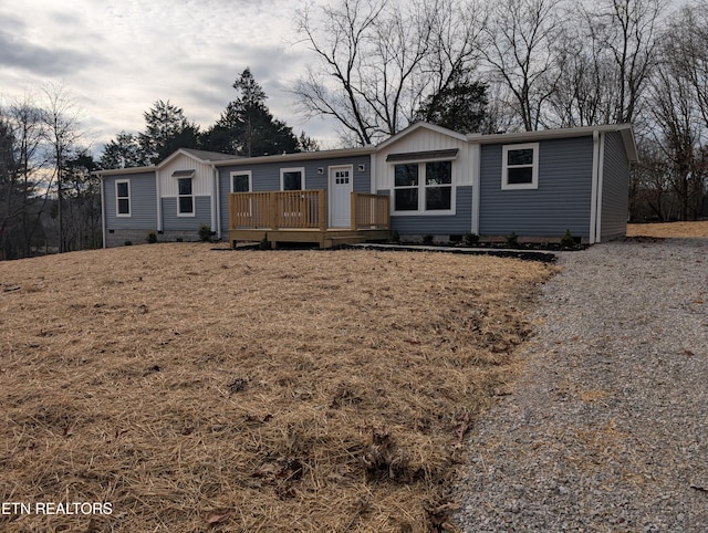 view of front of home featuring a wooden deck