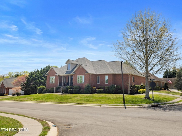 view of front of property with a front lawn