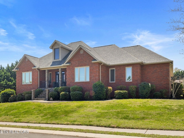 view of front of house with a front lawn