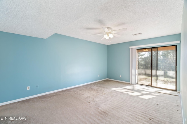 unfurnished room with light carpet, a textured ceiling, and ceiling fan