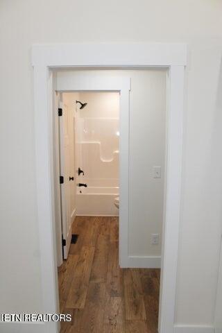 hall featuring dark hardwood / wood-style flooring