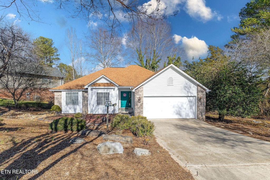 single story home with a garage