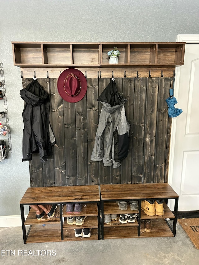 mudroom with concrete floors