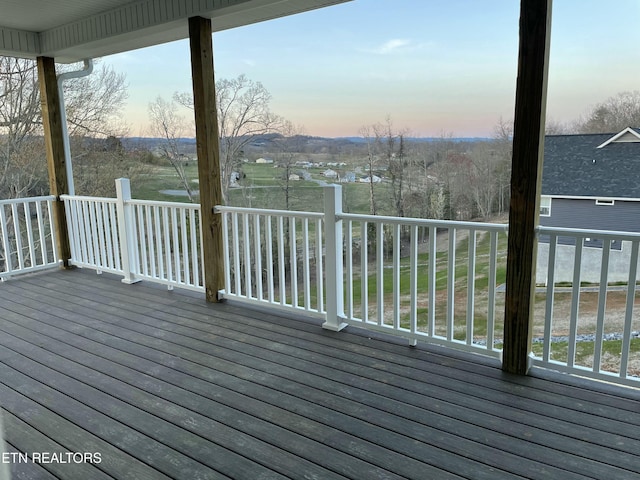 view of deck at dusk