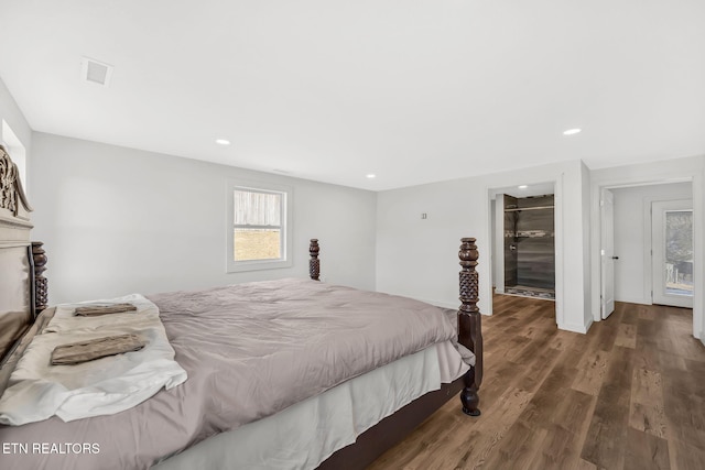 bedroom featuring visible vents, wood finished floors, and recessed lighting