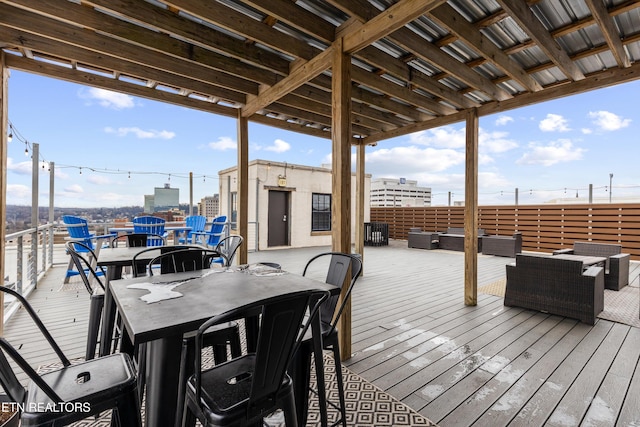 deck featuring outdoor lounge area