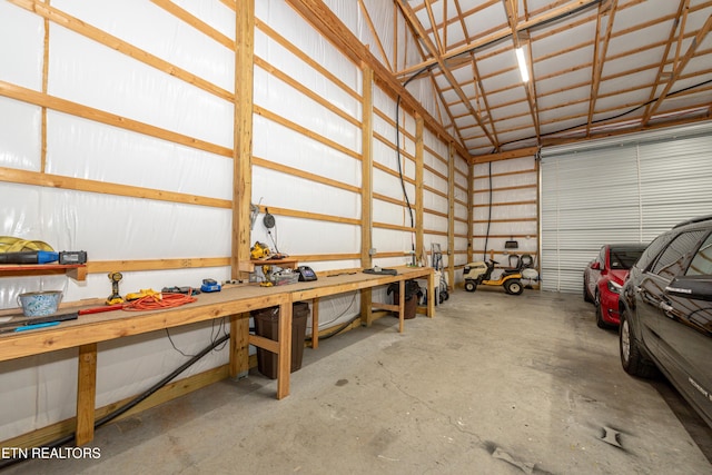 garage with a workshop area