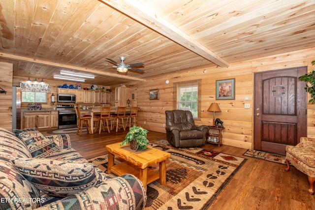 living room with beamed ceiling, wood-type flooring, and wood ceiling