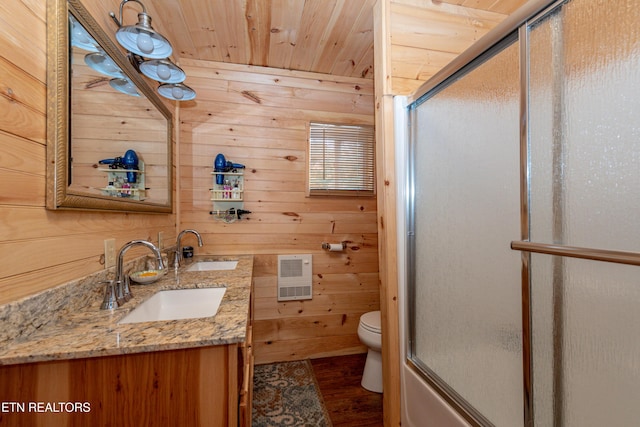 full bathroom with hardwood / wood-style floors, vanity, wood walls, toilet, and wood ceiling