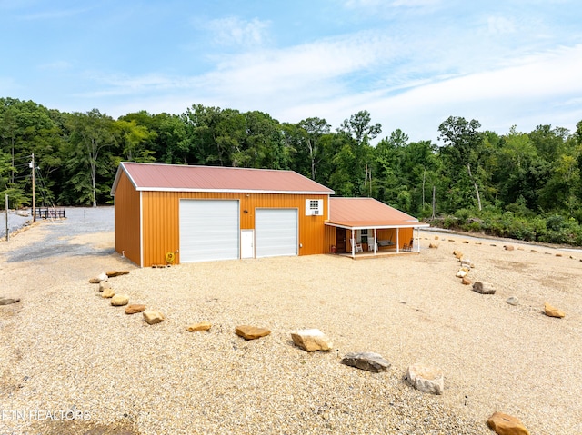 view of outdoor structure with a garage