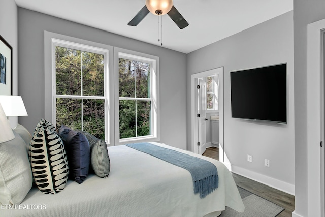 bedroom featuring hardwood / wood-style floors and ceiling fan