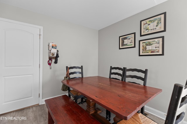 dining room featuring wood-type flooring