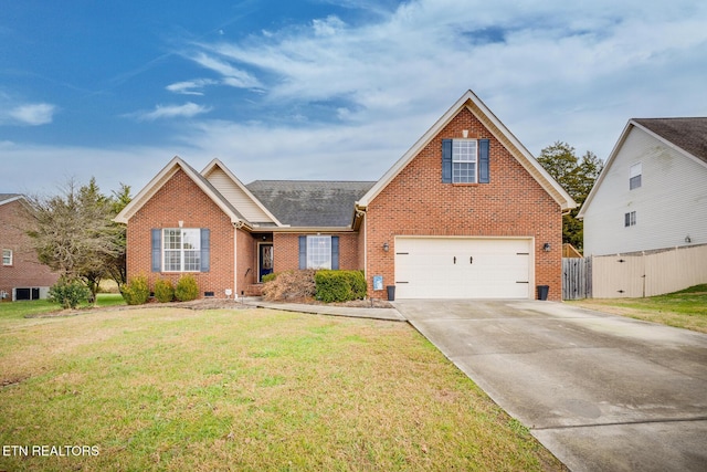 view of front of home featuring a front yard and a garage