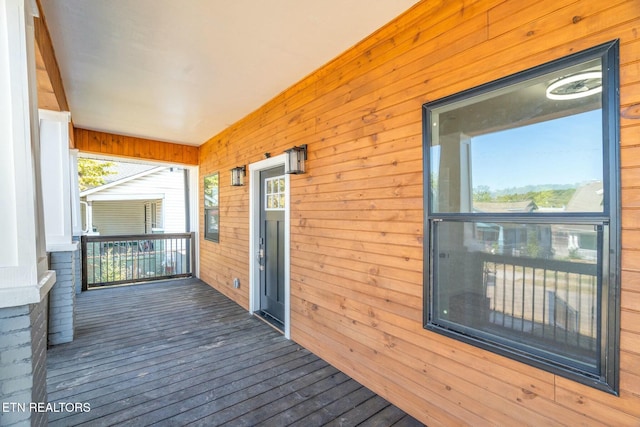 wooden terrace with covered porch