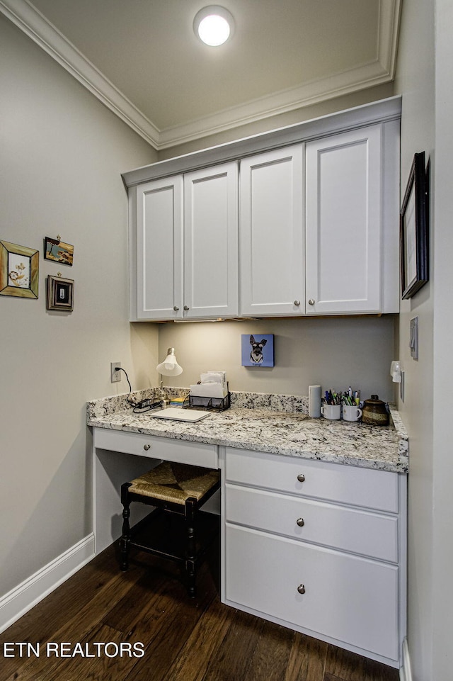 interior space with dark hardwood / wood-style flooring and ornamental molding