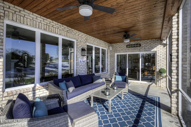 view of patio / terrace featuring an outdoor living space and ceiling fan