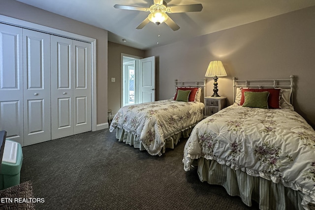 carpeted bedroom with a closet and ceiling fan