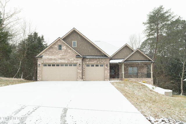 craftsman house with a garage