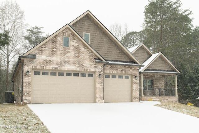 craftsman-style house with covered porch and central AC