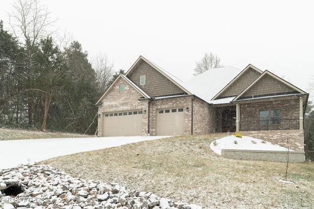 craftsman-style house featuring a garage