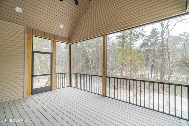 unfurnished sunroom with lofted ceiling and wood ceiling