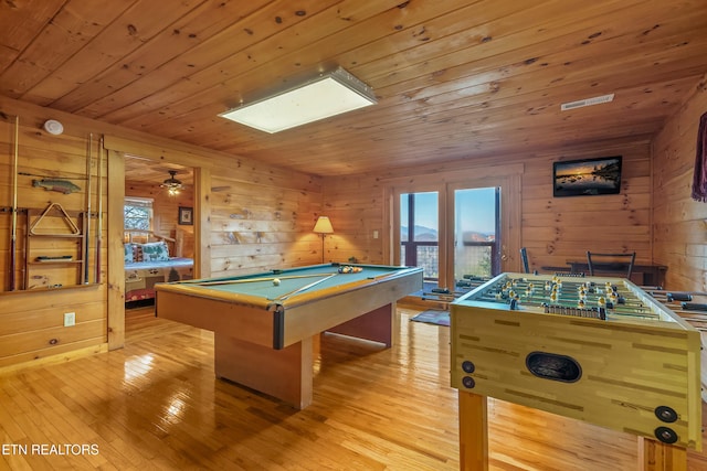 game room featuring pool table, wooden walls, light hardwood / wood-style floors, and wood ceiling