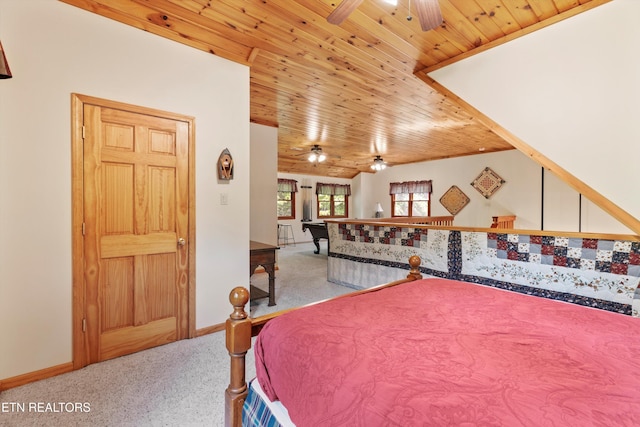 carpeted bedroom with ceiling fan and wood ceiling