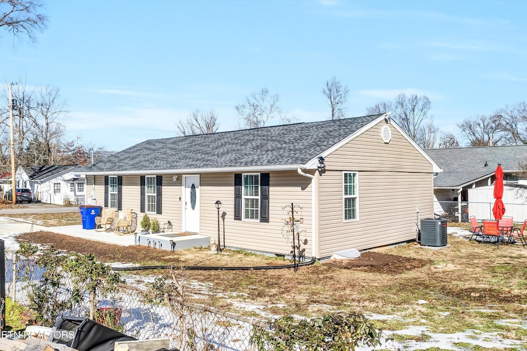 single story home with central AC unit