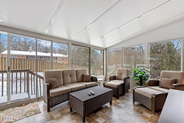 sunroom with lofted ceiling