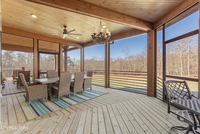 unfurnished sunroom with ceiling fan with notable chandelier and wooden ceiling