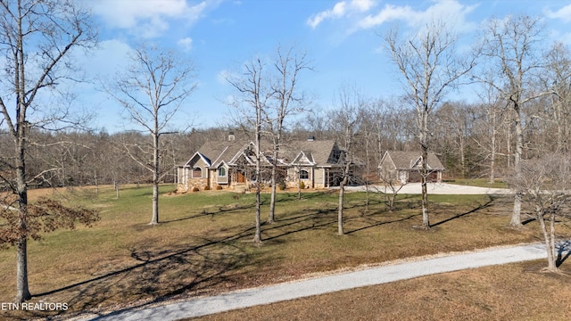 view of front of home with a front lawn