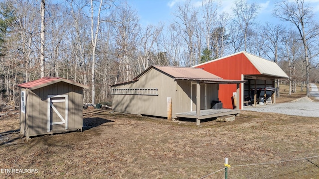 view of outbuilding with a lawn