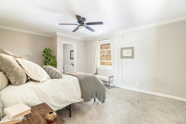 carpeted bedroom with ceiling fan, ensuite bathroom, and crown molding