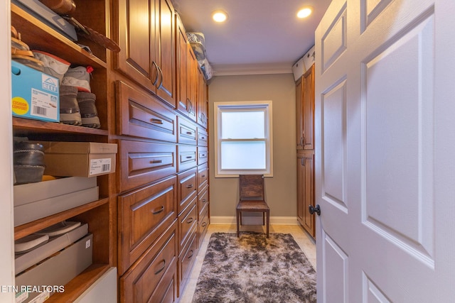 interior space with recessed lighting, crown molding, baseboards, and light tile patterned floors