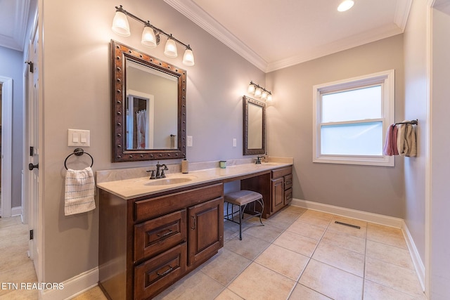 bathroom with tile patterned floors, vanity, and ornamental molding