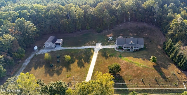 aerial view with a view of trees and a rural view