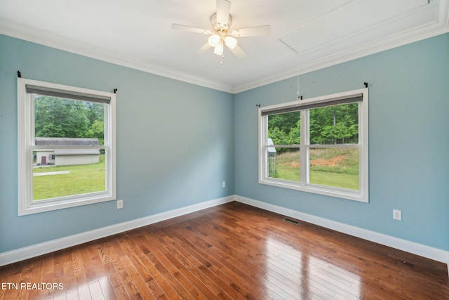 371 Pin Oak Dr, Rockwood, TN 37854 - empty room with attic access, ceiling fan, dark wood finished floors, and ornamental molding