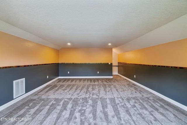 371 Pin Oak Dr, Rockwood, TN 37854 - unfurnished room featuring vaulted ceiling, carpet, recessed lighting, and a textured ceiling