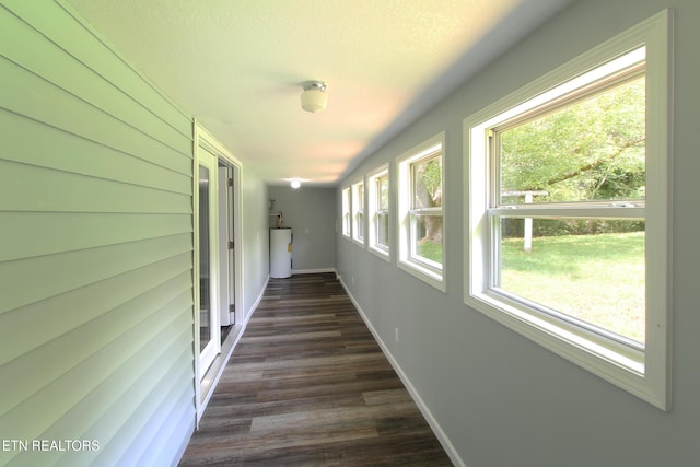 228 Pedigo Rd, Madisonville, TN 37354 - corridor with dark wood-style flooring and water heater